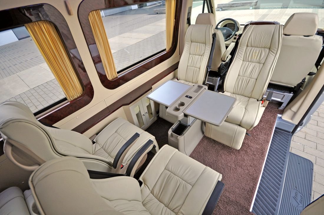 Leather seating inside a luxury chauffeur van